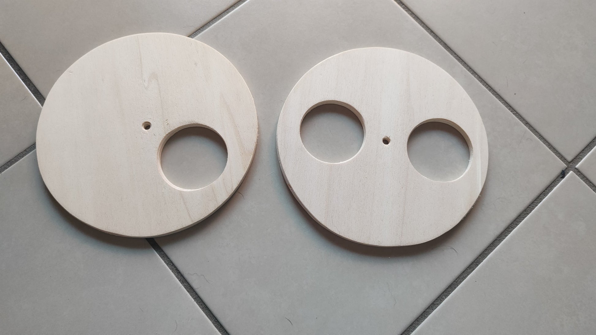 "Wooden Puzzle Game for Pets, showing stacked and rotatable discs to stimulate cognitive abilities. Perfect for rabbits, guinea pigs, rats, and other small pets."